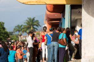 Lines Form Outside Petro-accepting Stores in Venezuela + More News